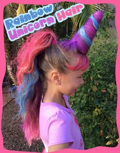 Crazy hair day FAVORITE! Rainbow Unicorn Hair. (We used a Styrofoam cone for horn - spray painted purple before wrapping hair.)