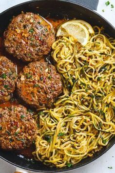 Cheesy Garlic Burgers with Lemon Butter Zucchini Noodles - Rich and juicy, you'll instantly fall in love with these hamburger patties served with plenty of lemony zucchini noodles.